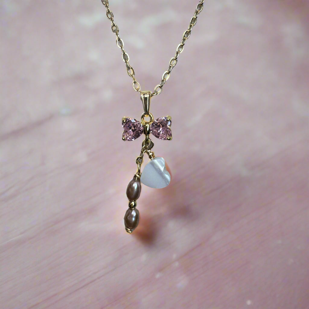 Pink Peacock Freshwater Pearl and Pink Cubic Zirconia Bow Gold-Filled Necklace